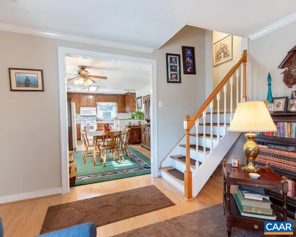 a view of a dining room with furniture and a window