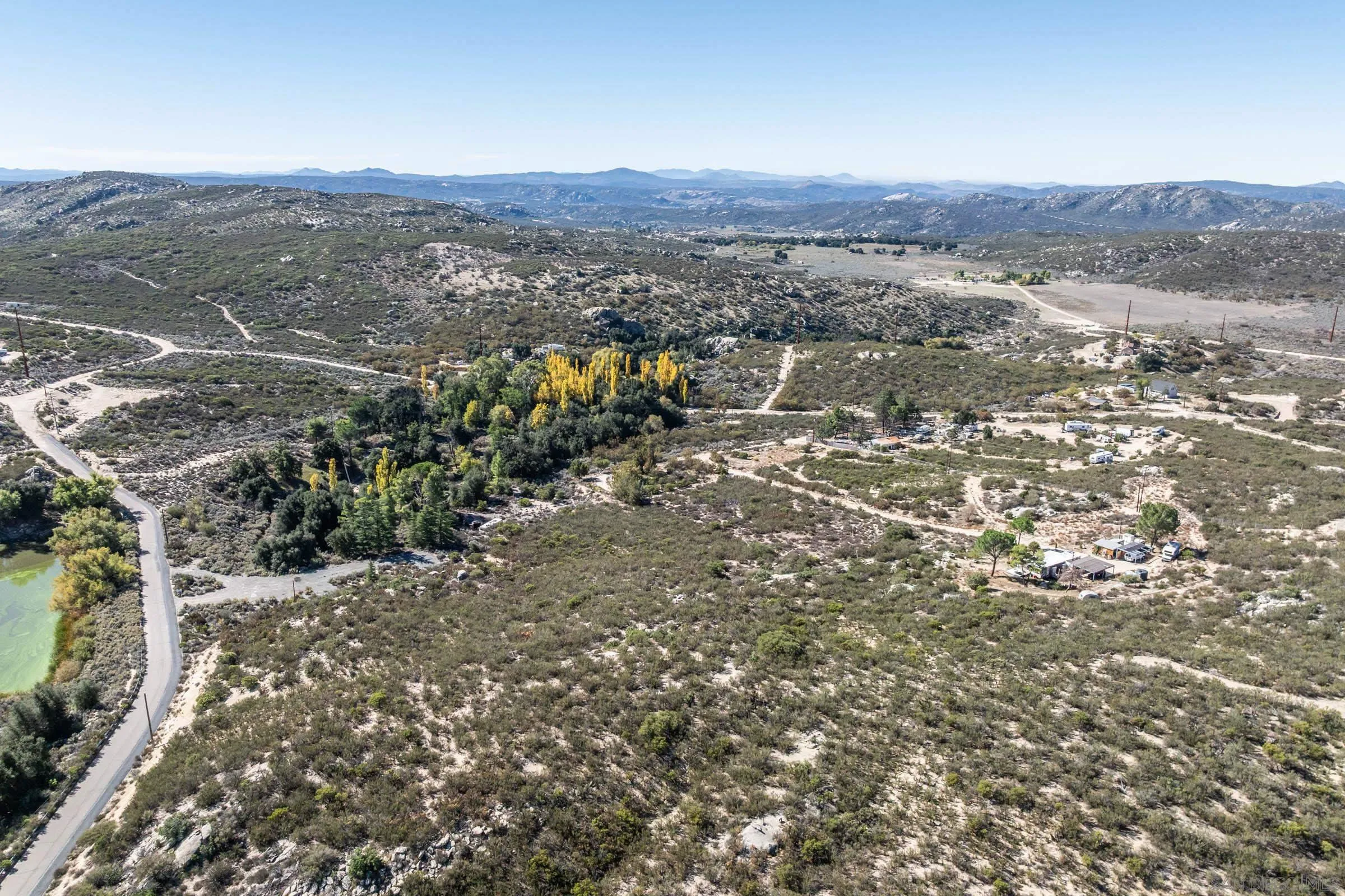 35627 Stagecoach Springs Road, Unit 567 Pine Valley, CA 91962 - Photo 19 of 23 an aerial view of residential house and green space