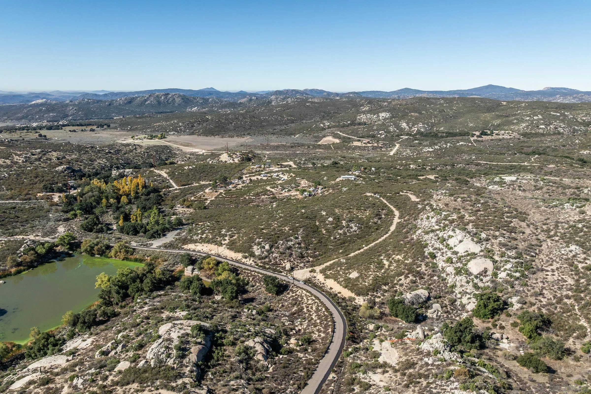 35627 Stagecoach Springs Road, Unit 567 Pine Valley, CA 91962 - Photo 3 of 23 a view of a city with mountains in the background