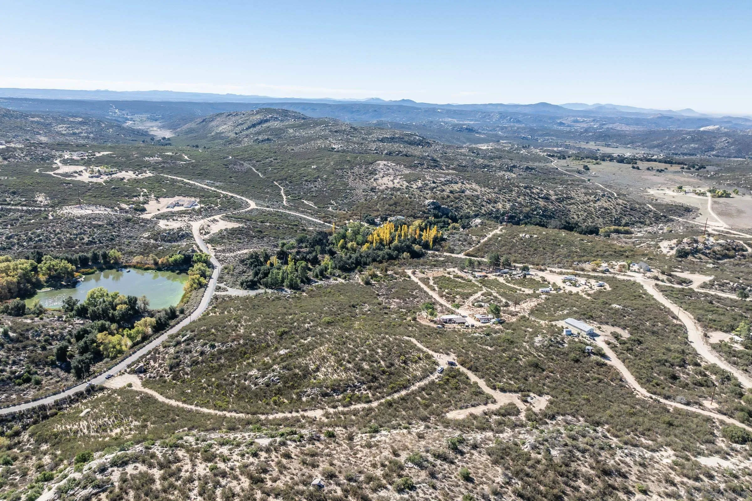 35627 Stagecoach Springs Road, Unit 567 Pine Valley, CA 91962 - Photo 7 of 23 an aerial view of residential house and green space