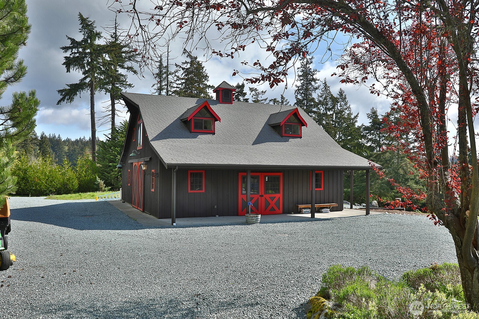 5741 Crow Haven Road Langley, WA 98260 - Photo 17 of 40 a front view of house with yard and trees around