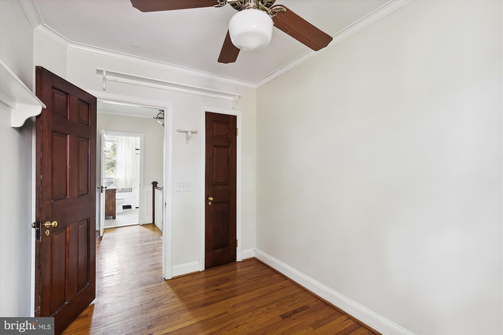 116 Murdock Road Baltimore, MD 21212 - Photo 14 of 42 a view of a hallway with wooden floor