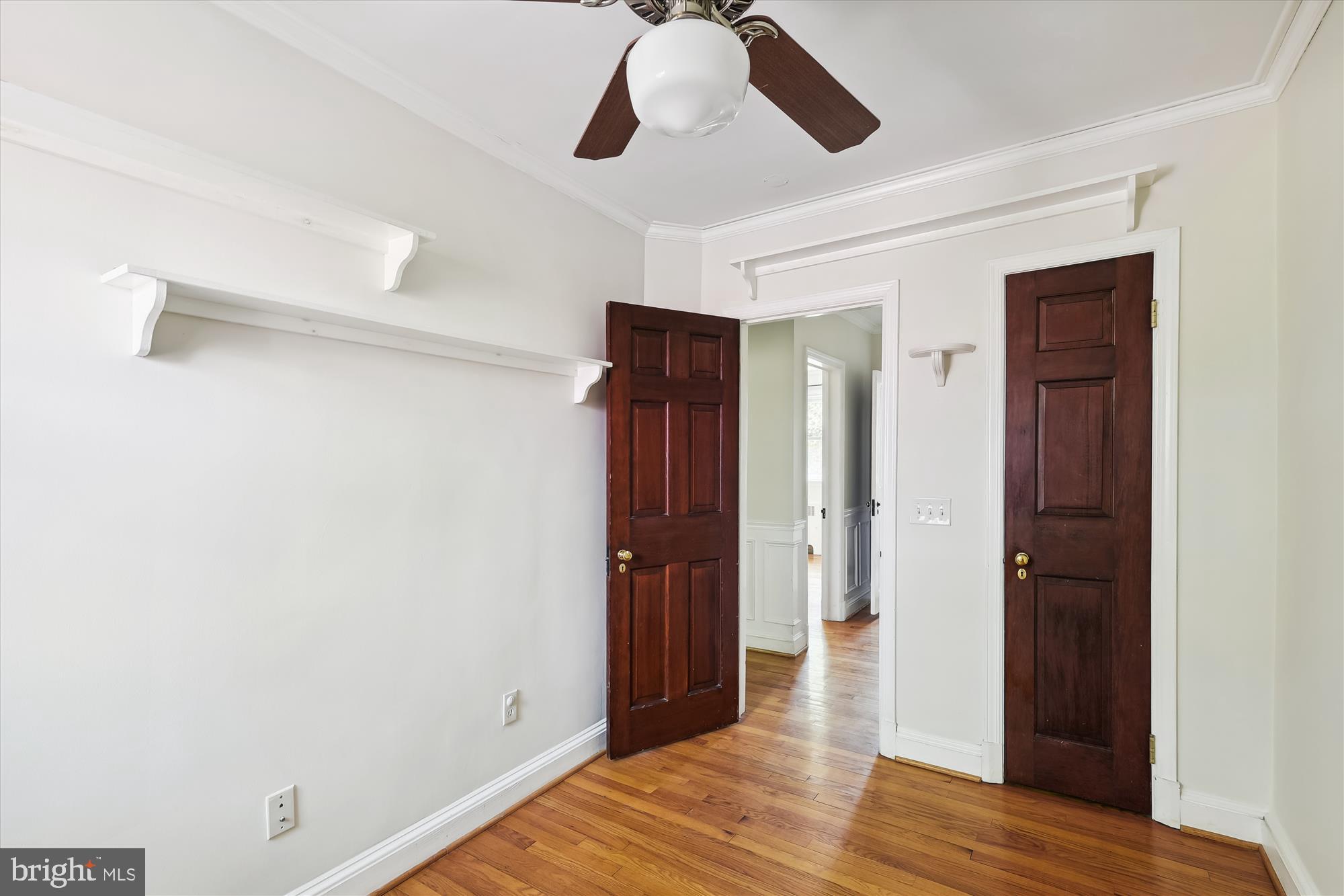 116 Murdock Road Baltimore, MD 21212 - Photo 15 of 42 a view of empty room with wooden floor