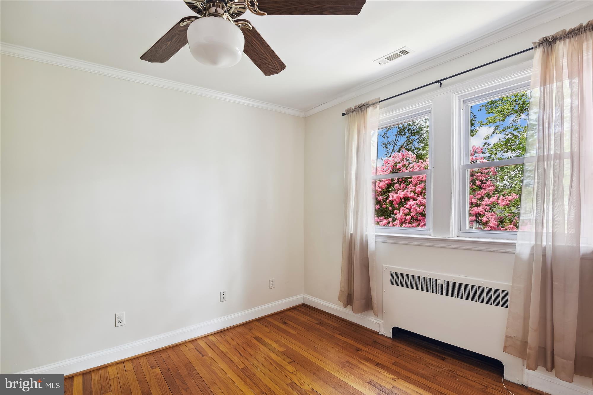 116 Murdock Road Baltimore, MD 21212 - Photo 18 of 42 wooden floor in an empty room
