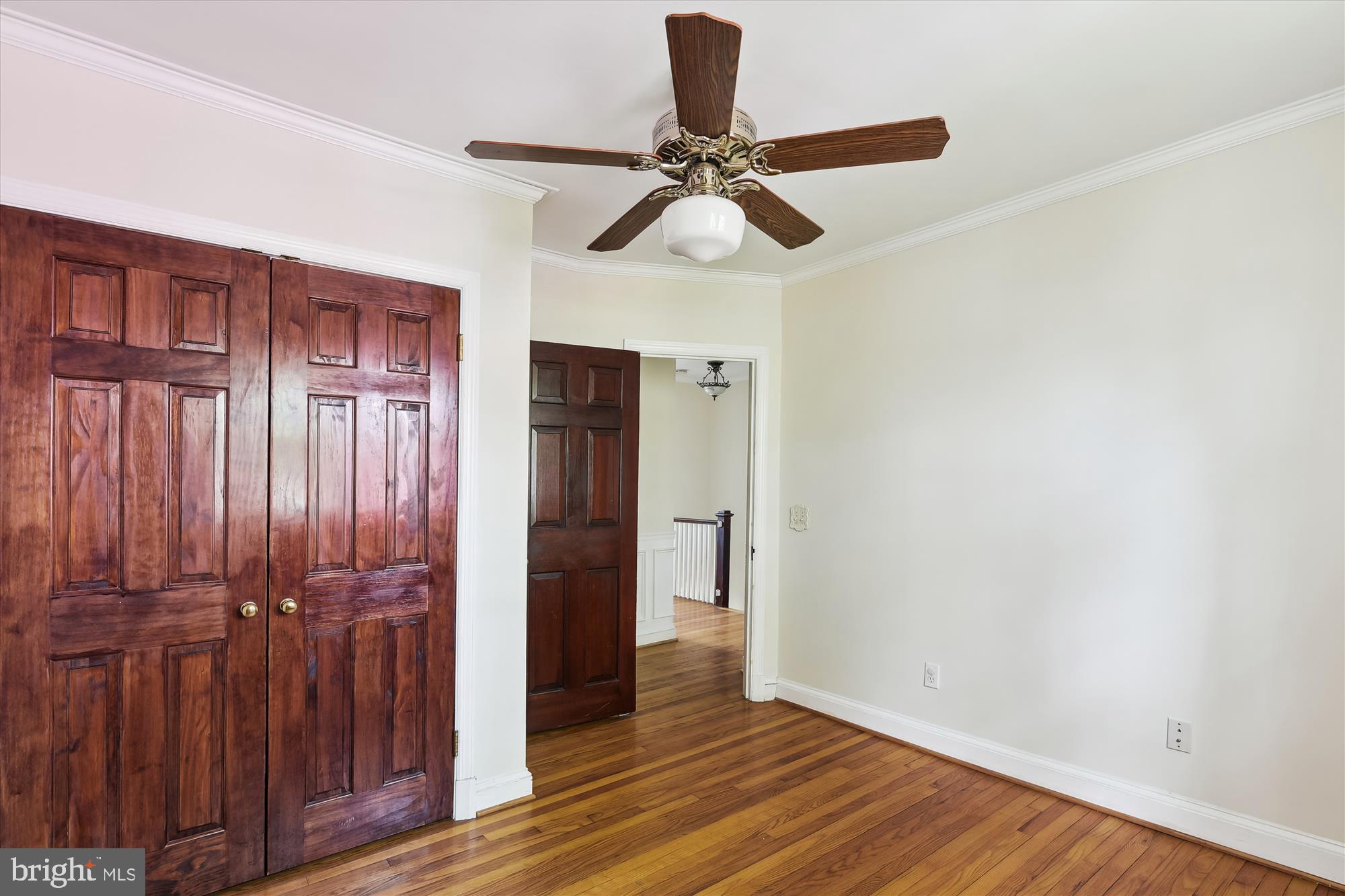 116 Murdock Road Baltimore, MD 21212 - Photo 19 of 42 a view of an empty room with wooden floor