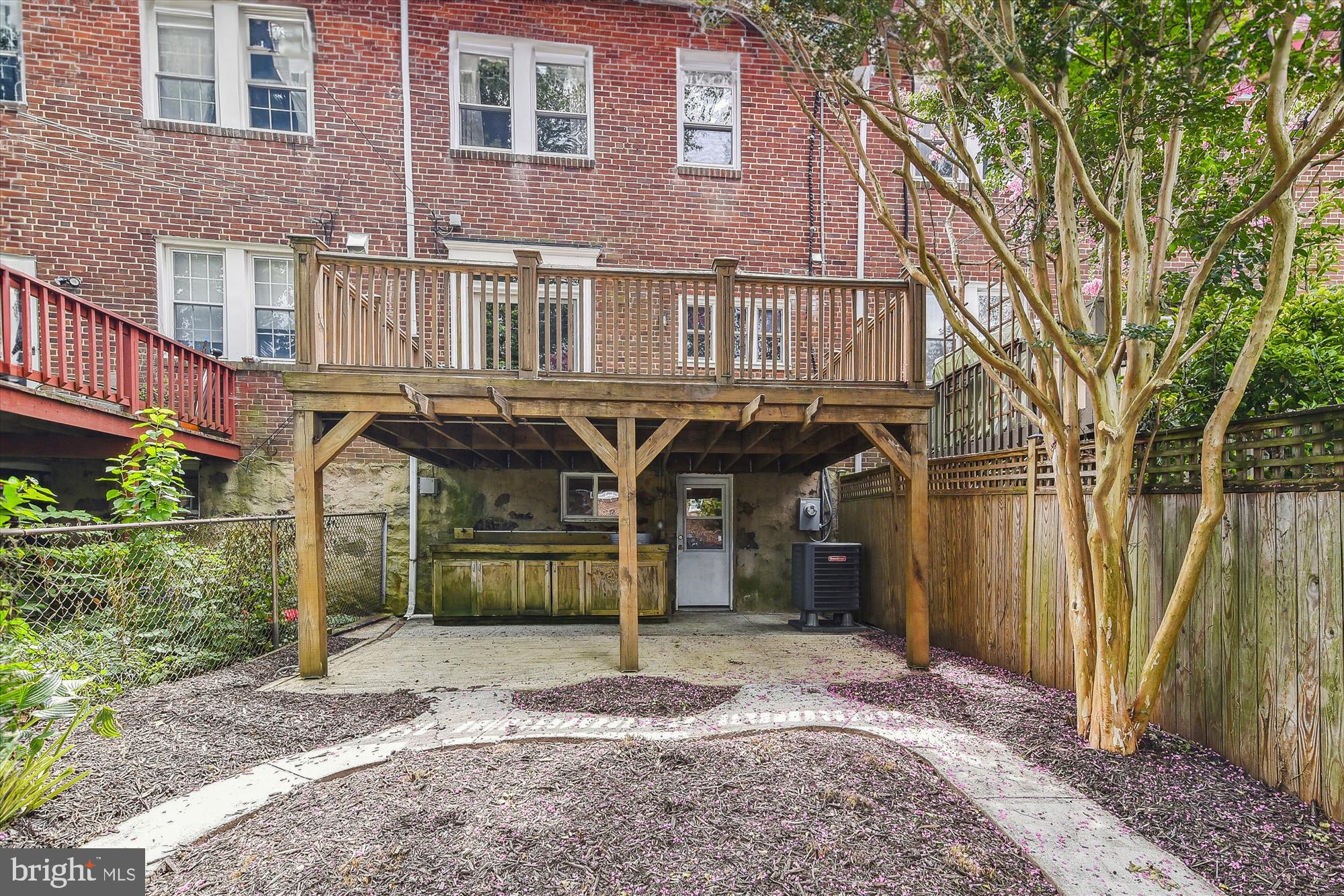116 Murdock Road Baltimore, MD 21212 - Photo 35 of 42 a front view of a house with a garden