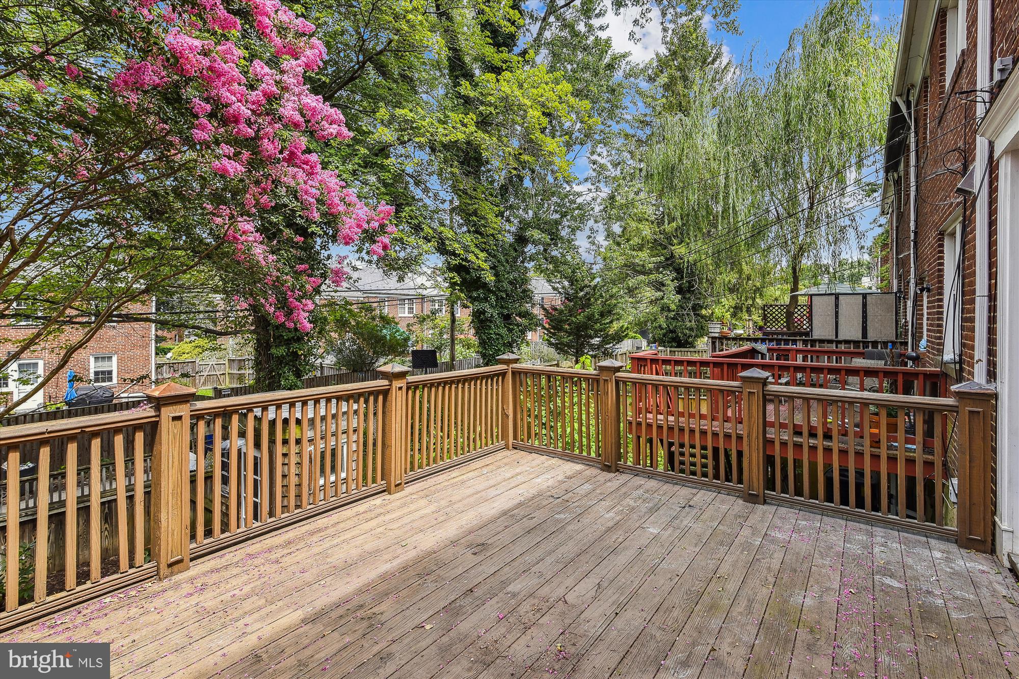 116 Murdock Road Baltimore, MD 21212 - Photo 37 of 42 a balcony with wooden floor and trees