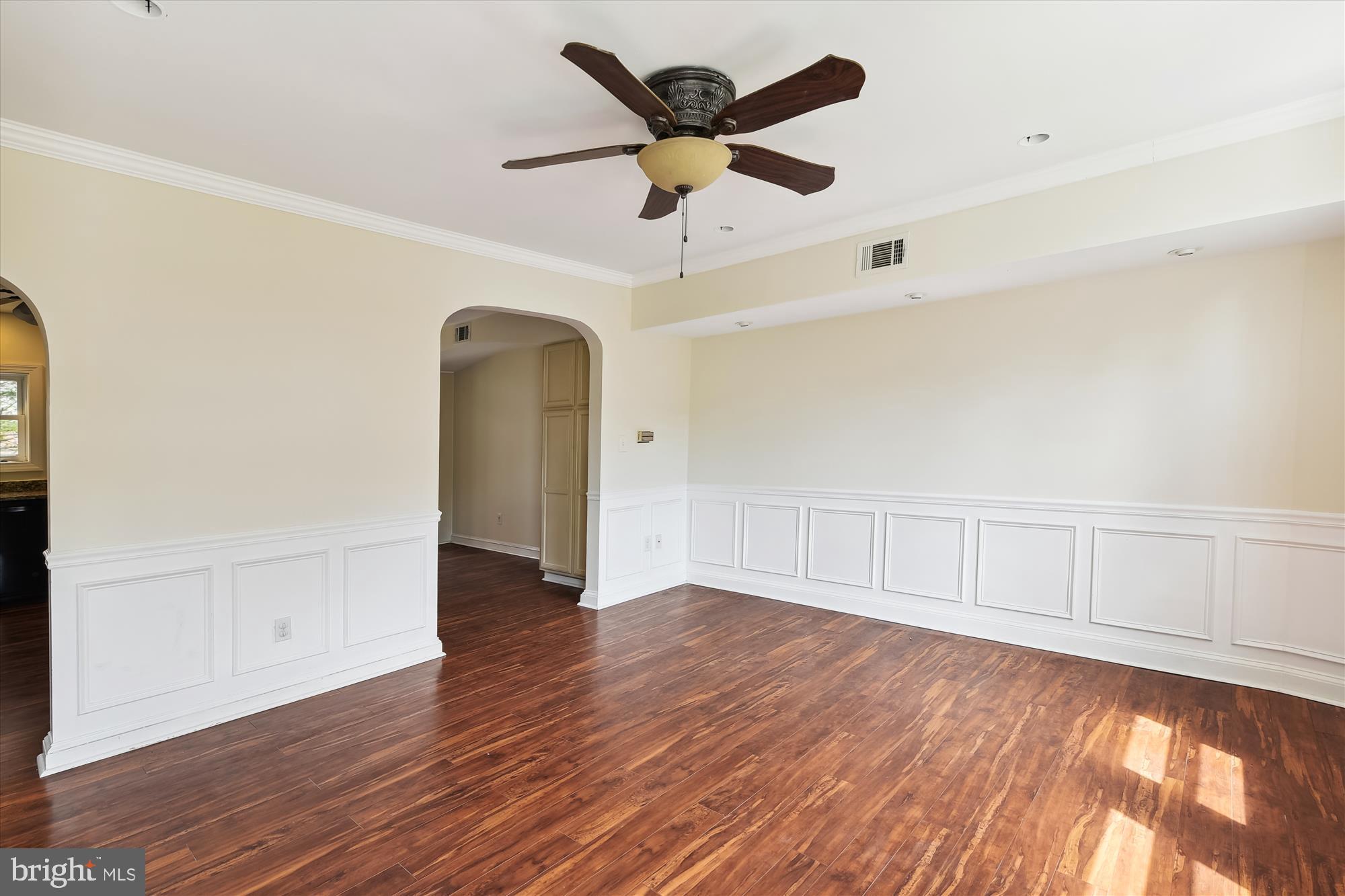 116 Murdock Road Baltimore, MD 21212 - Photo 4 of 42 wooden floor in an empty room with a window
