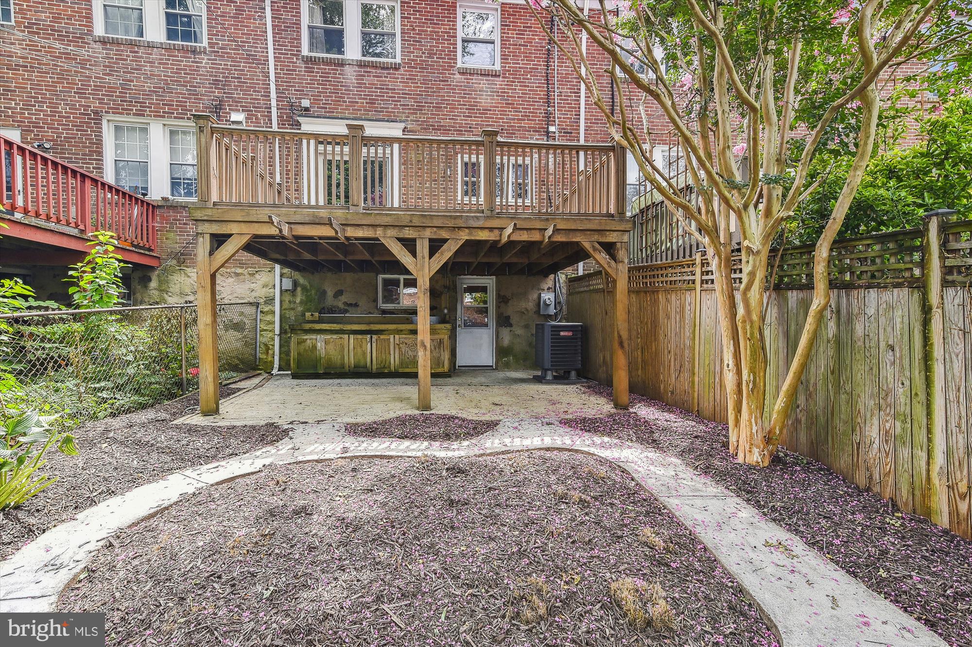 116 Murdock Road Baltimore, MD 21212 - Photo 41 of 42 a front view of a house with a garden
