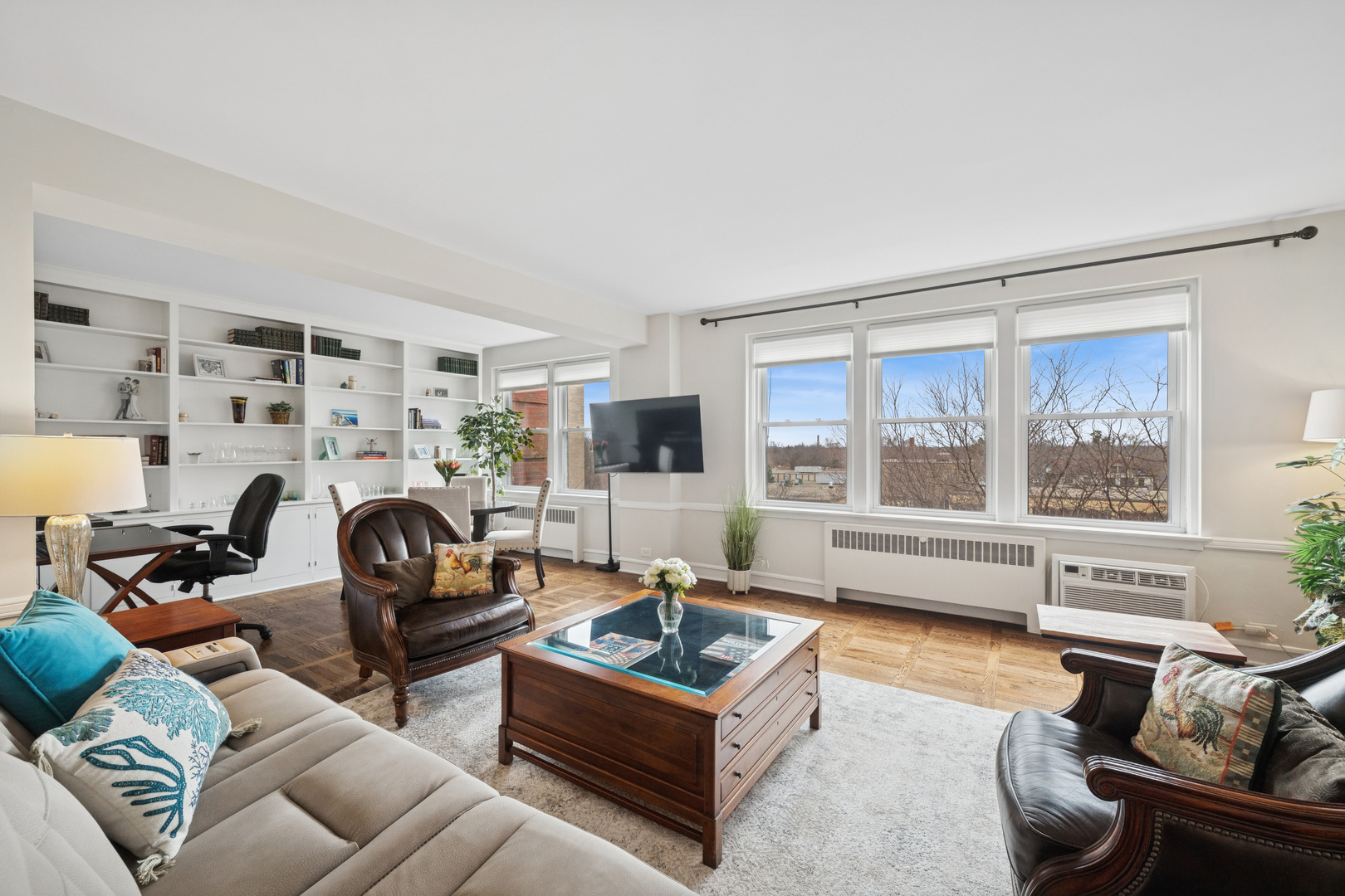 1585 Ridge Avenue, Unit 611 Evanston, IL 60201 - Photo 1 of 21 a living room with furniture and a large window