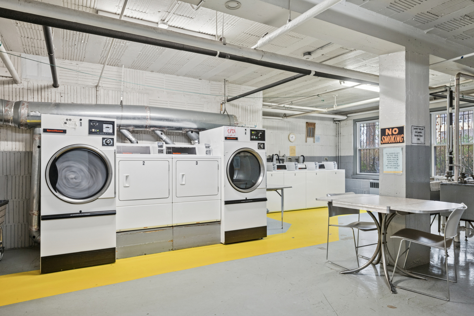 1585 Ridge Avenue, Unit 611 Evanston, IL 60201 - Photo 14 of 21 a utility room with dryer and washer