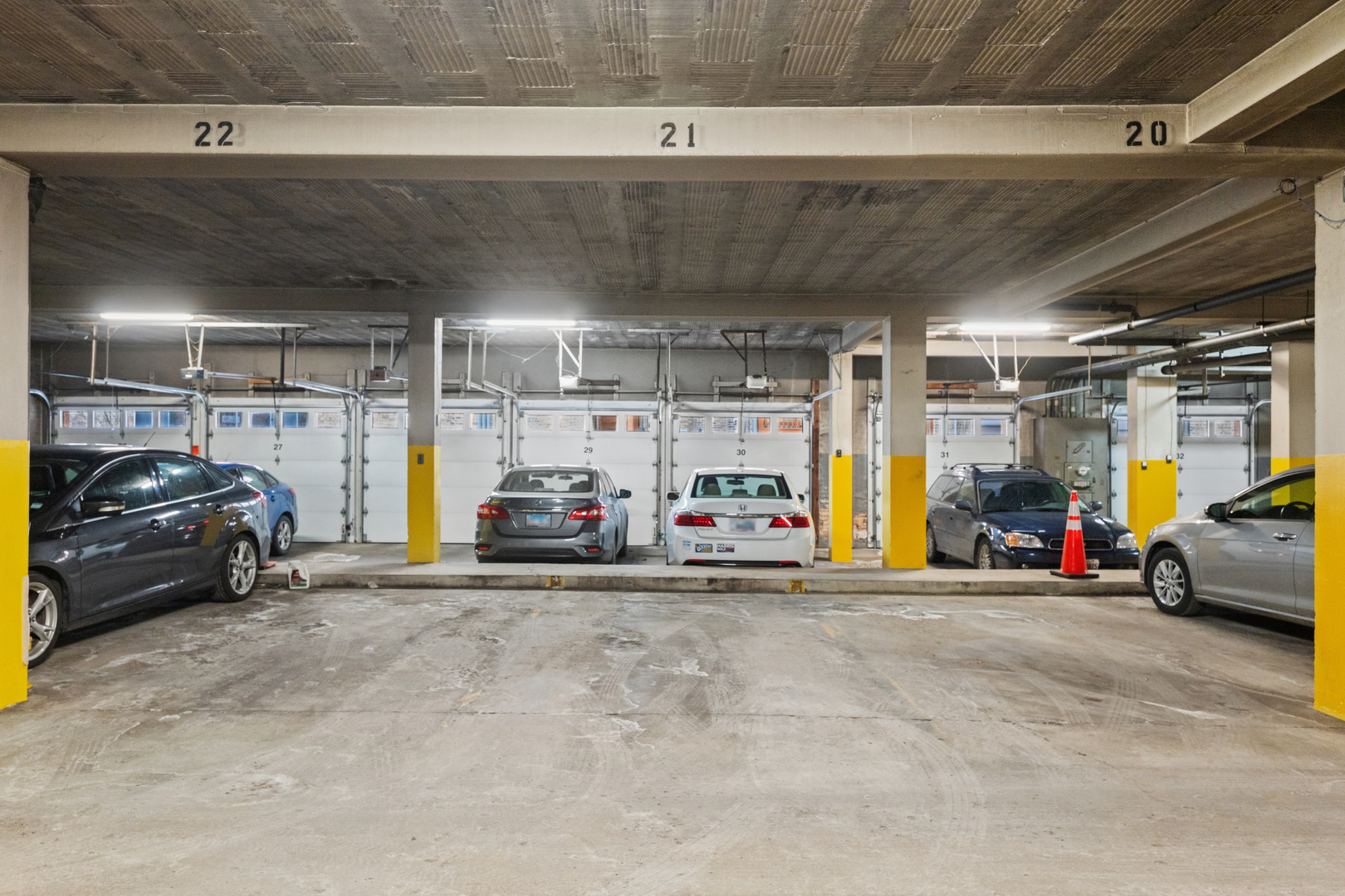 1585 Ridge Avenue, Unit 611 Evanston, IL 60201 - Photo 15 of 21 a view of parking garage with cars