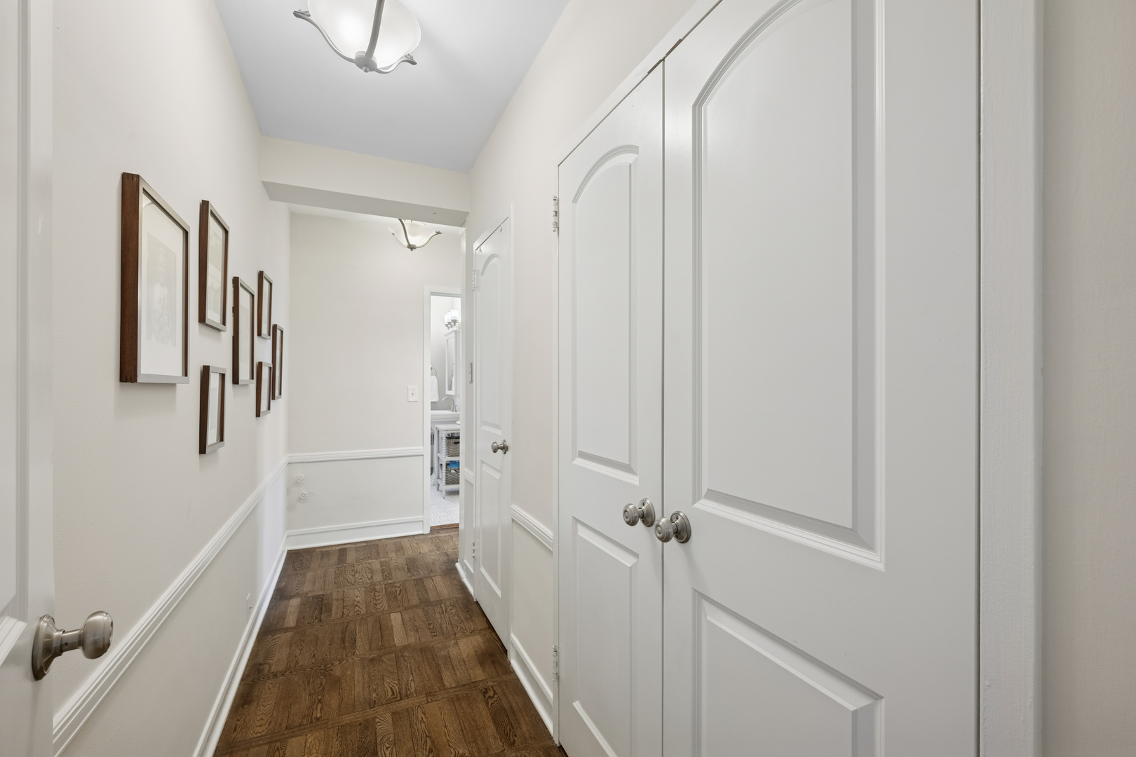 1585 Ridge Avenue, Unit 611 Evanston, IL 60201 - Photo 8 of 21 a view of a bathroom from the hallway