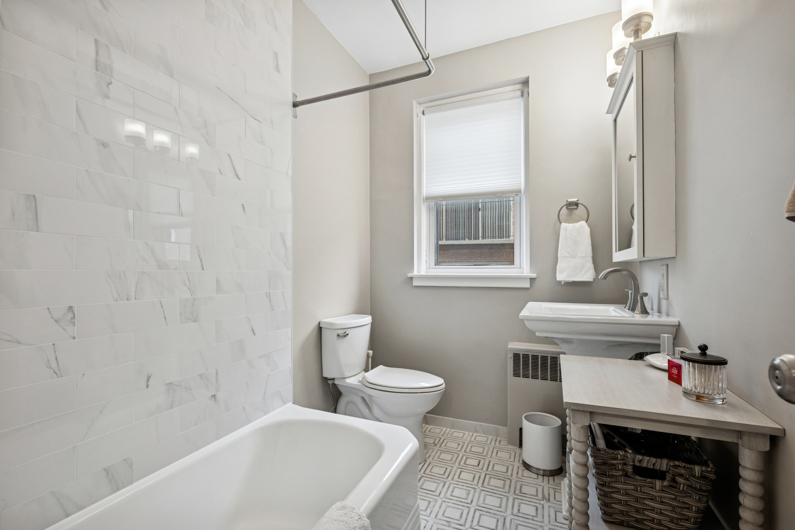 1585 Ridge Avenue, Unit 611 Evanston, IL 60201 - Photo 9 of 21 a bathroom with a sink a toilet and shower