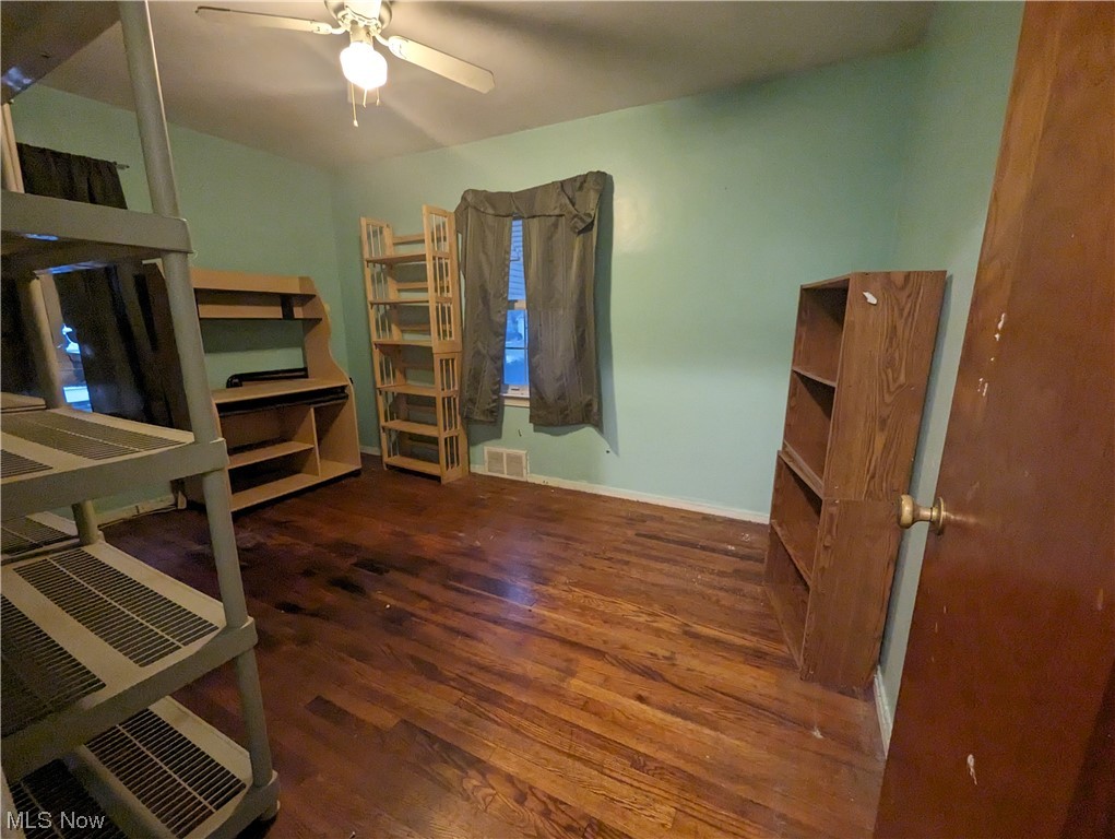 653 Rokeby Road Eastlake, OH 44095 - Photo 12 of 15 Bedroom featuring ceiling fan and dark hardwood / wood-style flooring