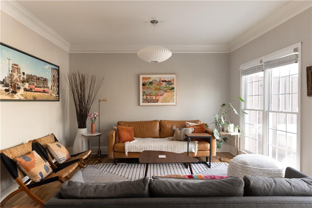 7 Chief Matthews Road, Unit 2B Decatur, GA 30030 - Photo 11 of 41 a living room with furniture and a window