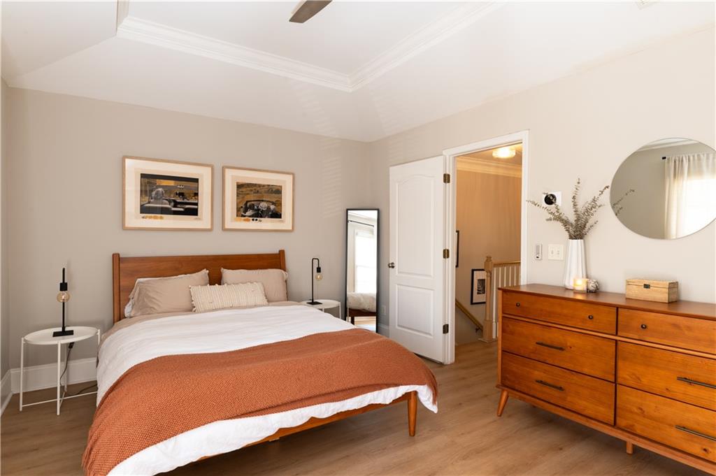 7 Chief Matthews Road, Unit 2B Decatur, GA 30030 - Photo 15 of 41 a bedroom with a bed and a dresser