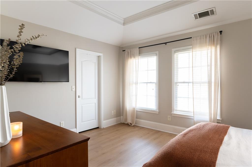 7 Chief Matthews Road, Unit 2B Decatur, GA 30030 - Photo 16 of 41 a living room with furniture and a flat screen tv