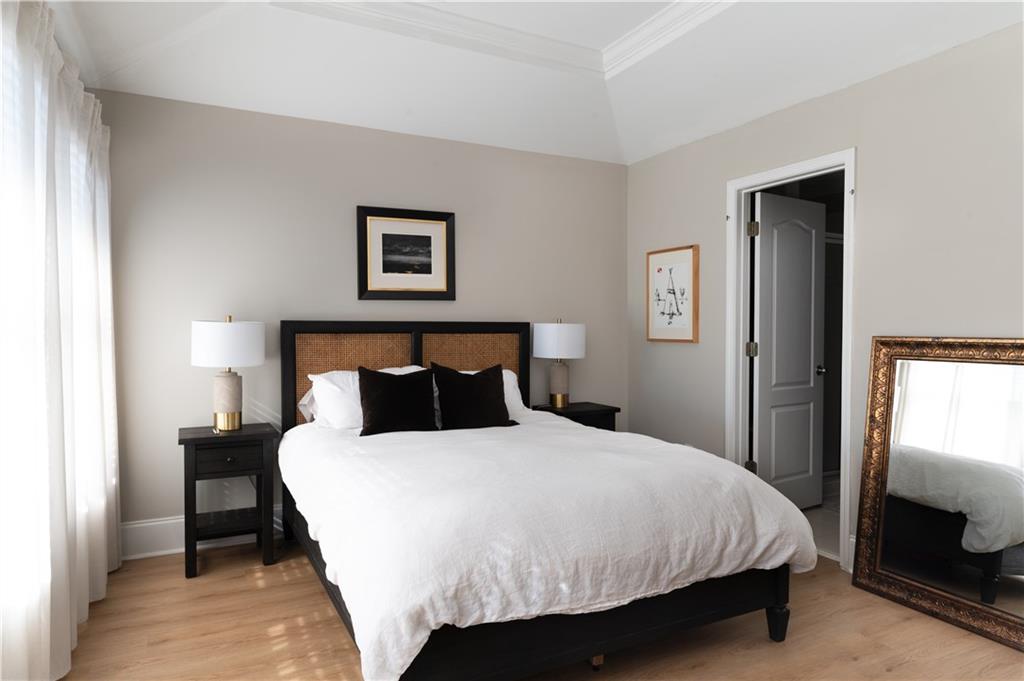 7 Chief Matthews Road, Unit 2B Decatur, GA 30030 - Photo 23 of 41 a bedroom with a bed and a window