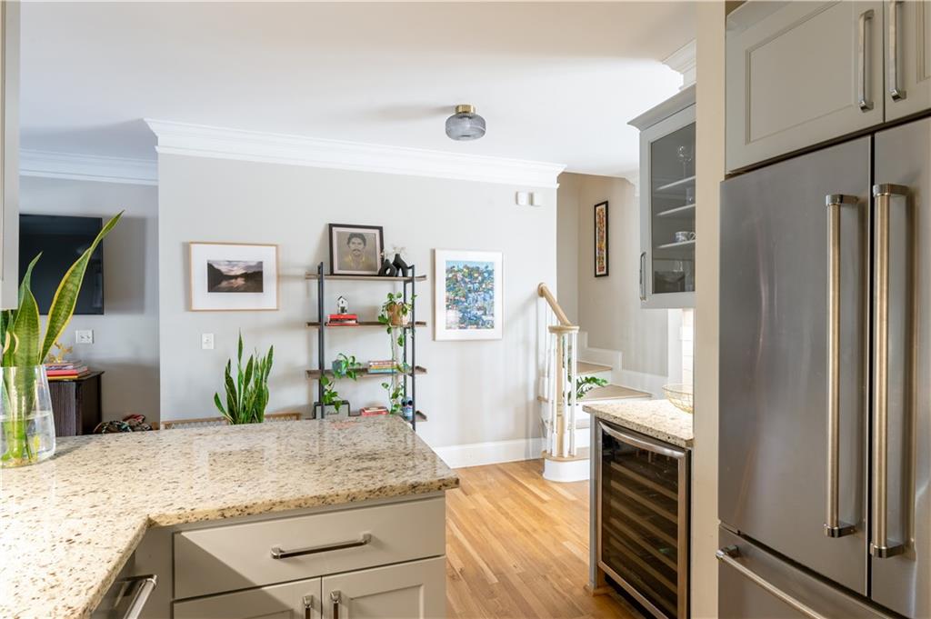 7 Chief Matthews Road, Unit 2B Decatur, GA 30030 - Photo 7 of 41 a kitchen with stainless steel appliances granite countertop a refrigerator and a sink
