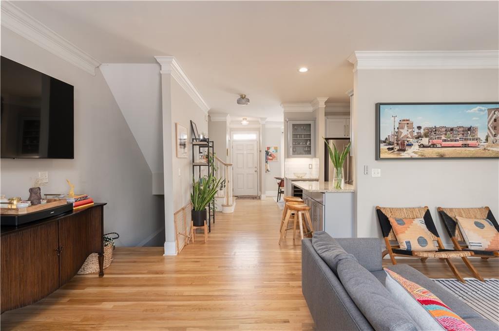 7 Chief Matthews Road, Unit 2B Decatur, GA 30030 - Photo 9 of 41 a living room with furniture and a flat screen tv