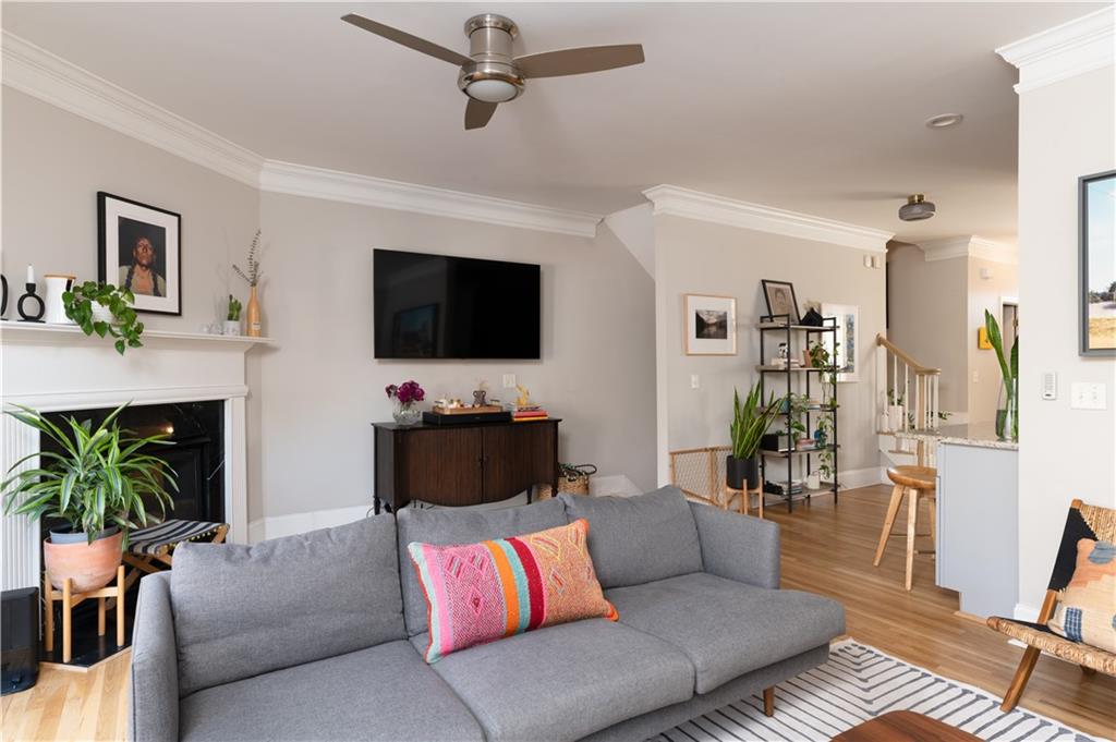 7 Chief Matthews Road, Unit 2B Decatur, GA 30030 - Photo 10 of 41 a living room with furniture and a flat screen tv
