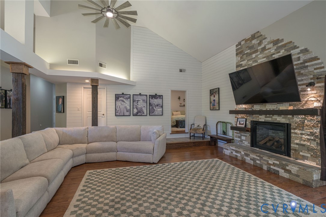 12700 Coalboro Road Chesterfield, VA 23838 - Photo 19 of 50 Vaulted ceiling living space featuring wood-finish