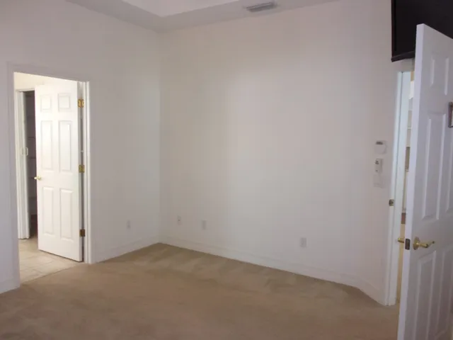 a view of a bathroom with toilet