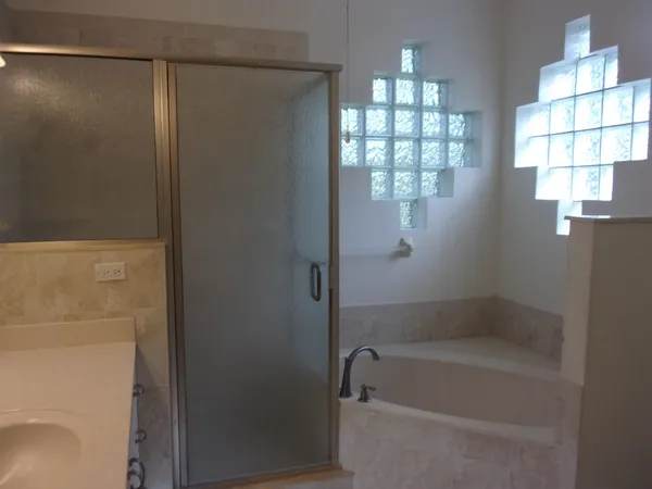 a view of a hallway with washer and dryer