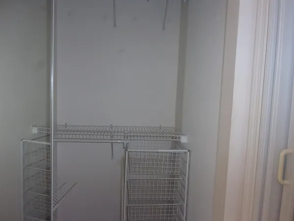 a view of a room with racks on the wall