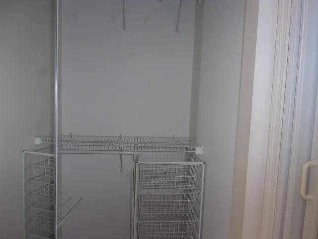 a view of a room with racks on the wall