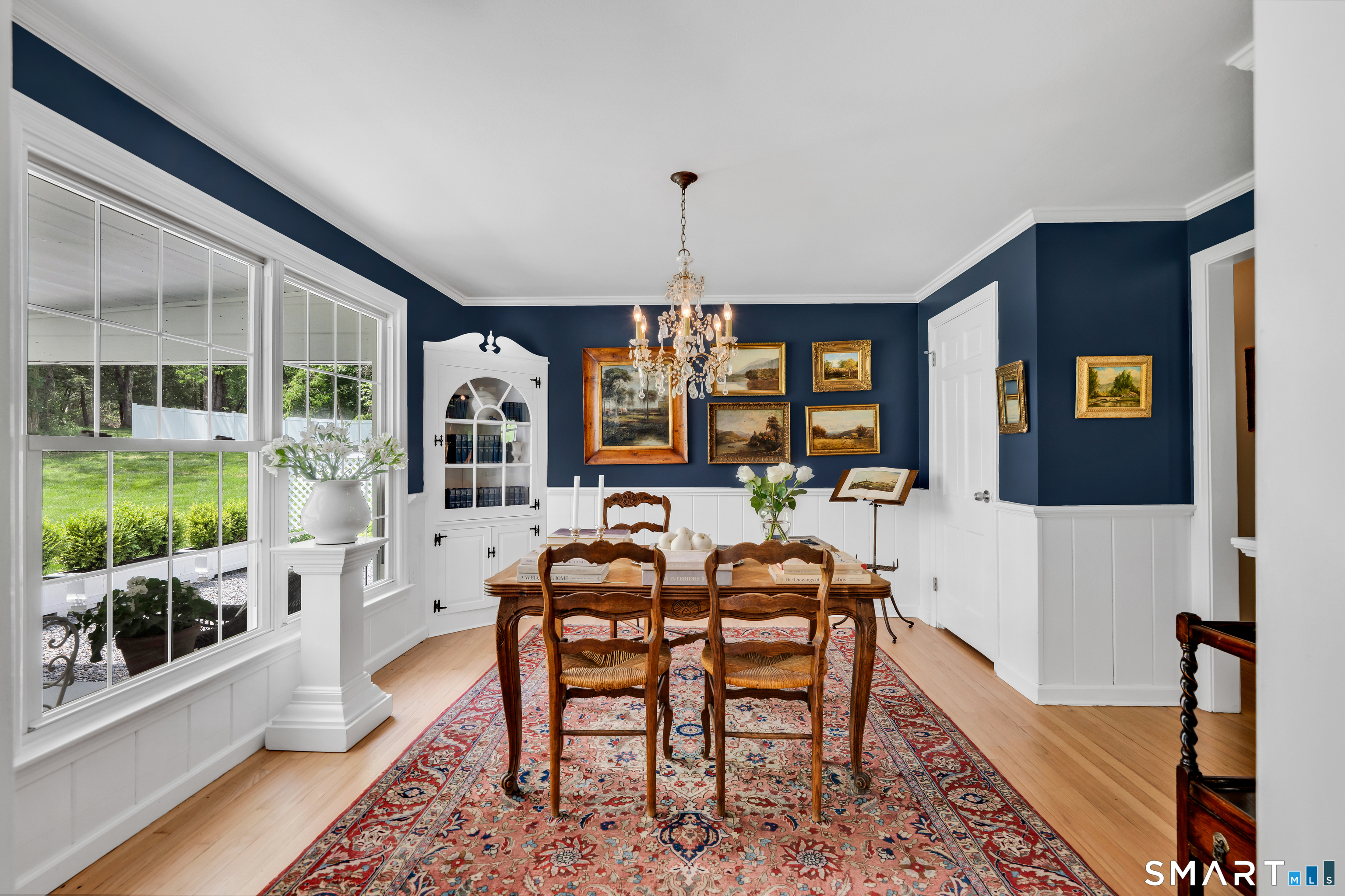 1000 Bassett Road Watertown, CT 06795 - Photo 14 of 35 a view of a dining room with furniture window and wooden floor