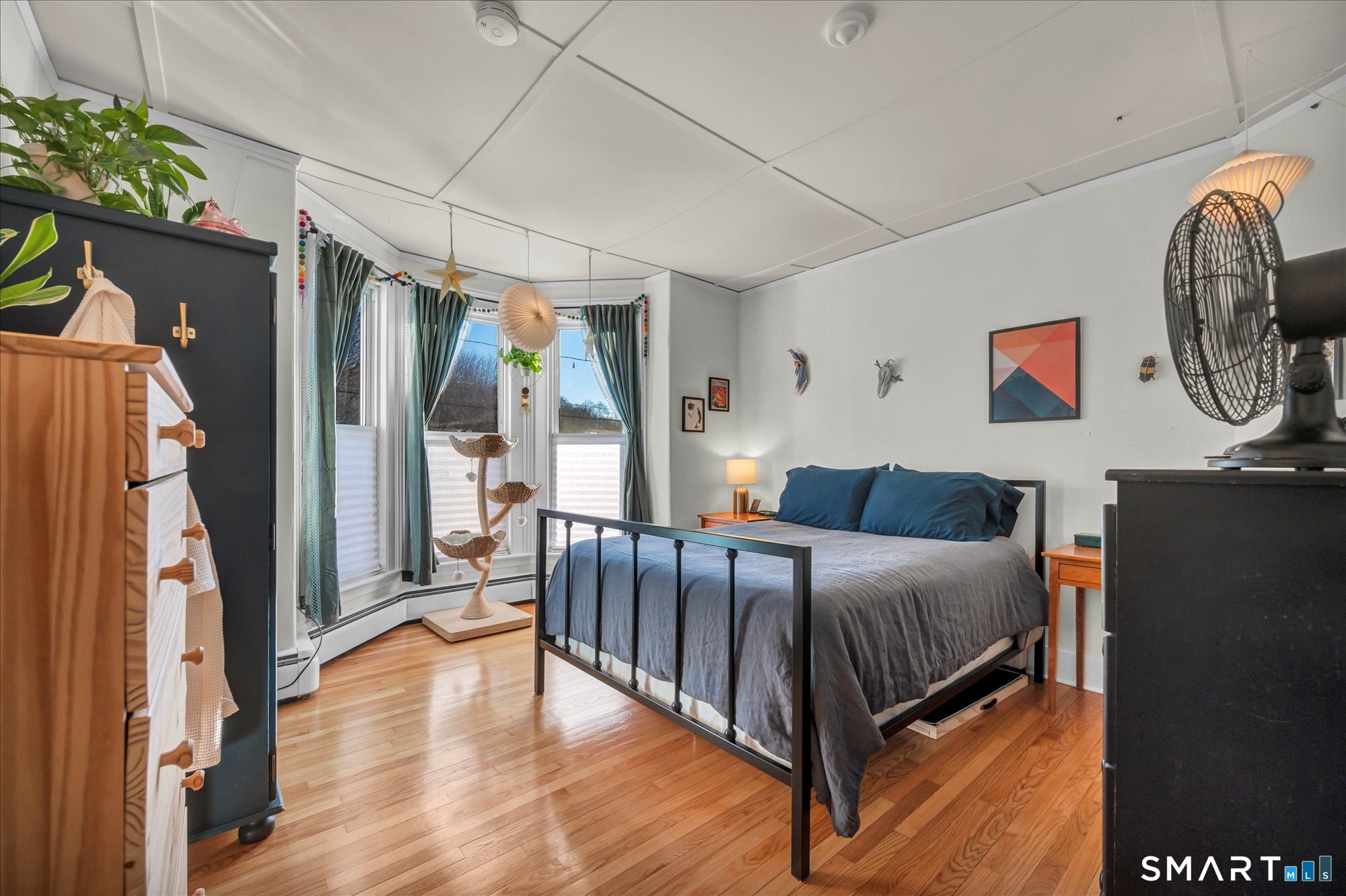 15 Mountain Street Vernon, CT 06066 - Photo 7 of 17 a bedroom with bed and wooden floor