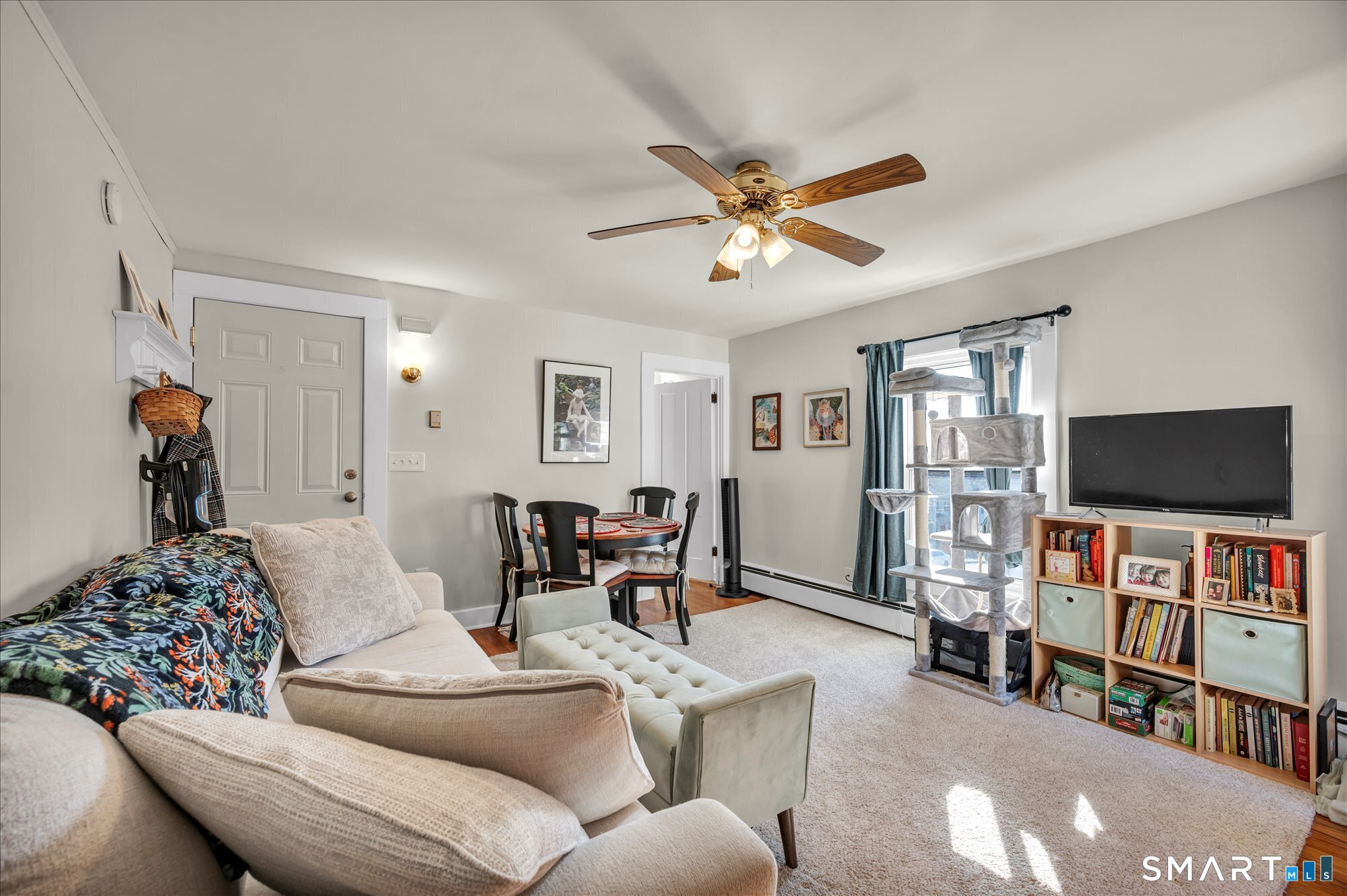 15 Mountain Street Vernon, CT 06066 - Photo 8 of 17 a living room with furniture and a flat screen tv