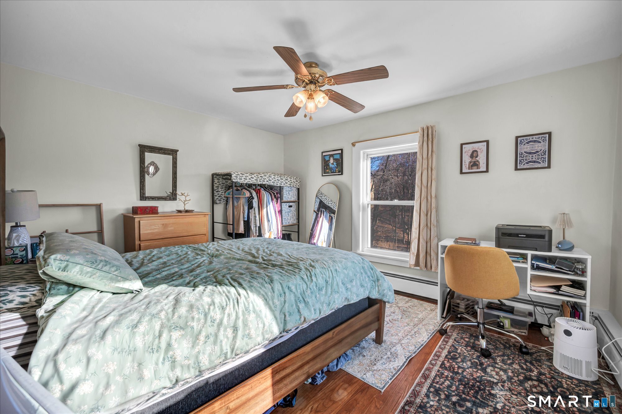 15 Mountain Street Vernon, CT 06066 - Photo 10 of 17 a bedroom with furniture and a window