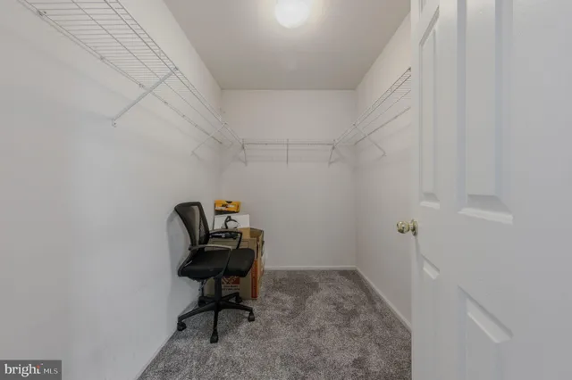 a bathroom with a sink a vanity and a mirror