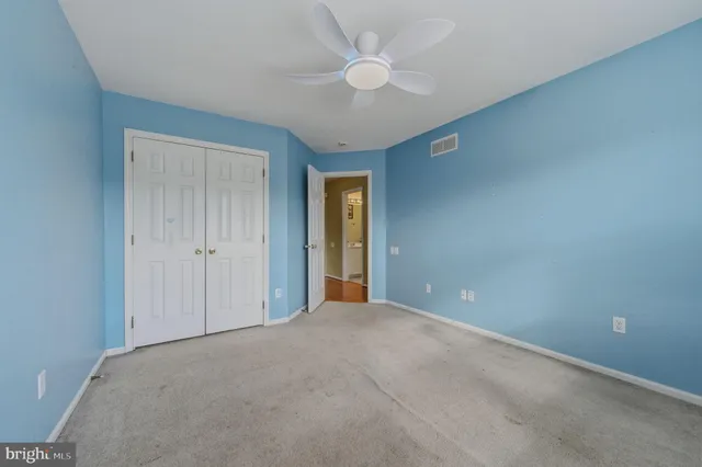 a view of a house with a yard porch and sitting area