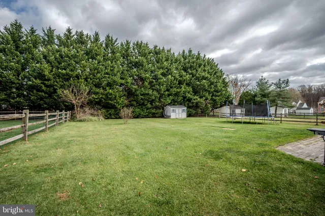 a view of storage and utility room with washer and dryer
