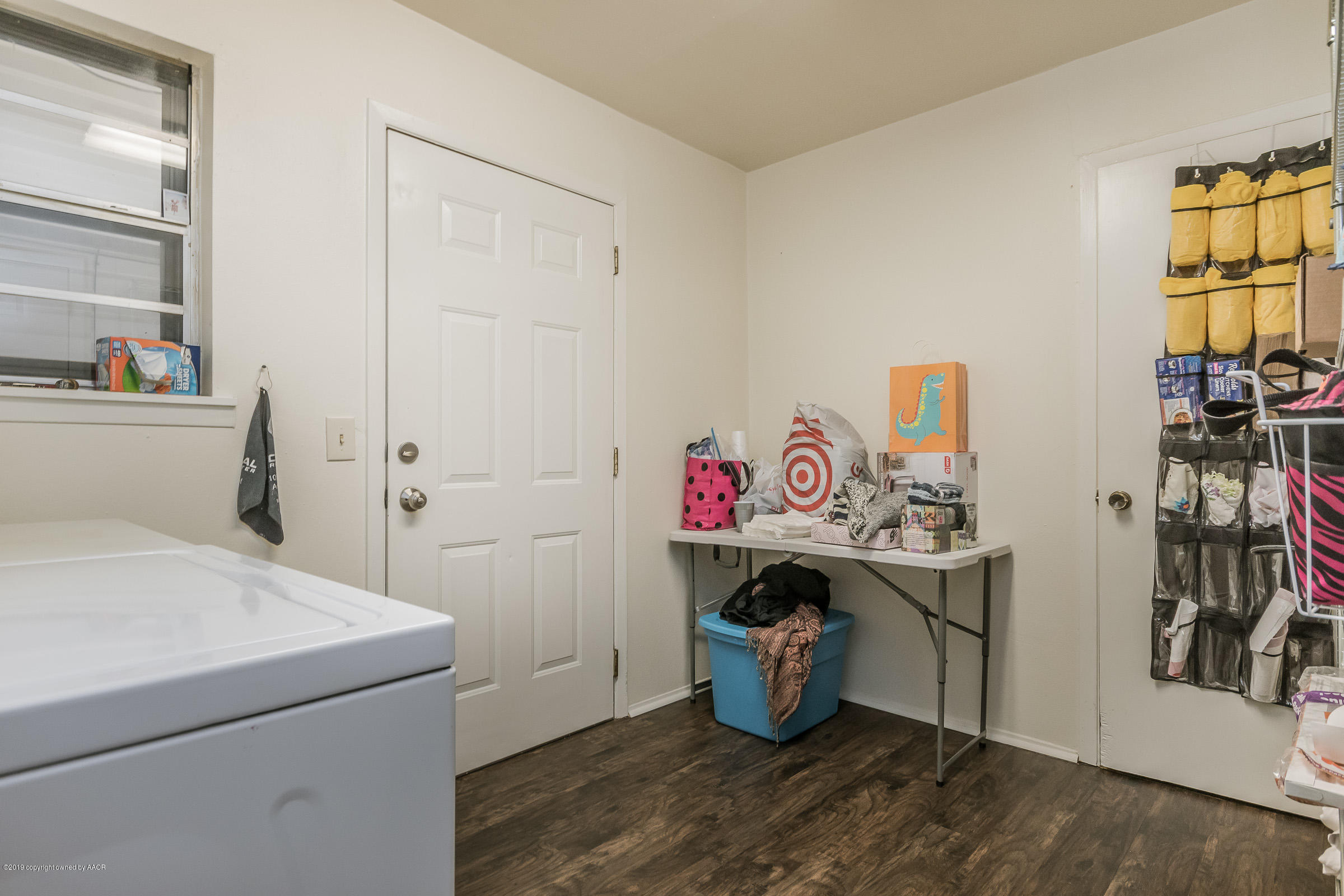 4318 South Hayden Street Amarillo, TX 79110 - Photo 8 of 15 a storage room with storage and utility