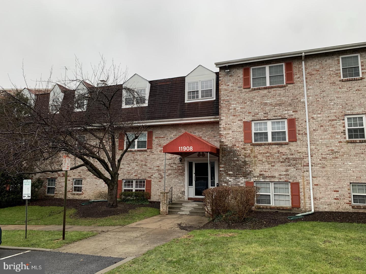 11908 Tarragon Road, Unit I Reisterstown, MD 21136 - Photo 1 of 9 Charming brick apartment entrance.