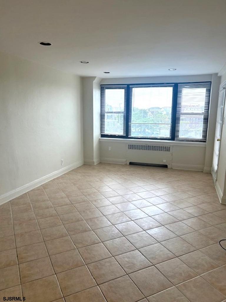 101 South Raleigh Avenue, Unit 320 Atlantic City, NJ 08401 - Photo 8 of 28 a view of an empty room with a window