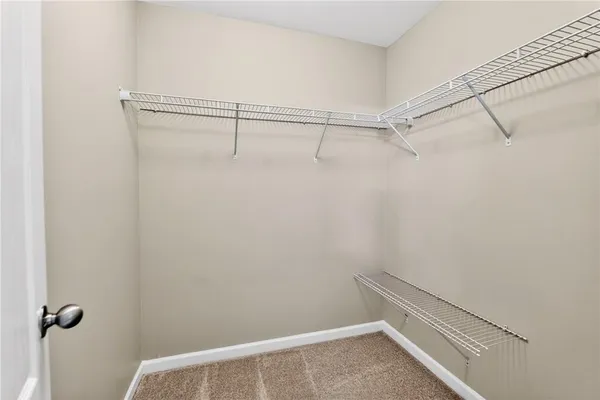 a view of a room with racks on the wall