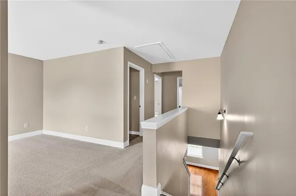 a view of a livingroom with furniture and wooden floor