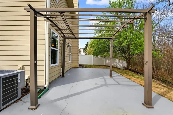 a view of a backyard with pathway