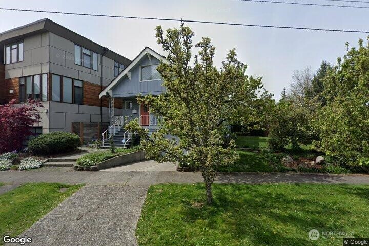 5217 Keystone Place North Seattle, WA 98103 - Photo 1 of 1 a backyard of a house with lots of green space