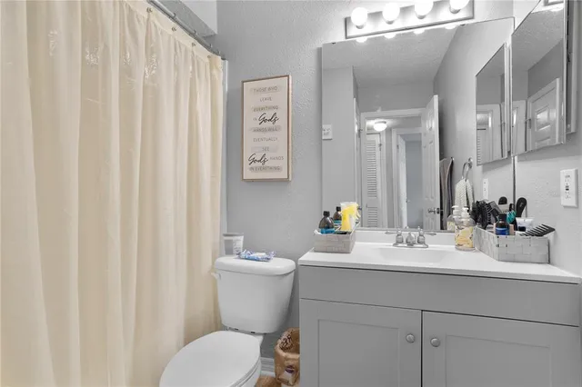 a view of a workspace room with furniture