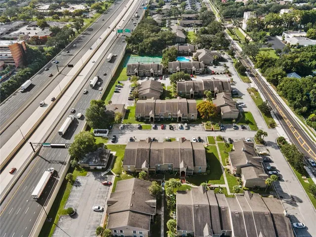 an aerial view of a city with ocean view