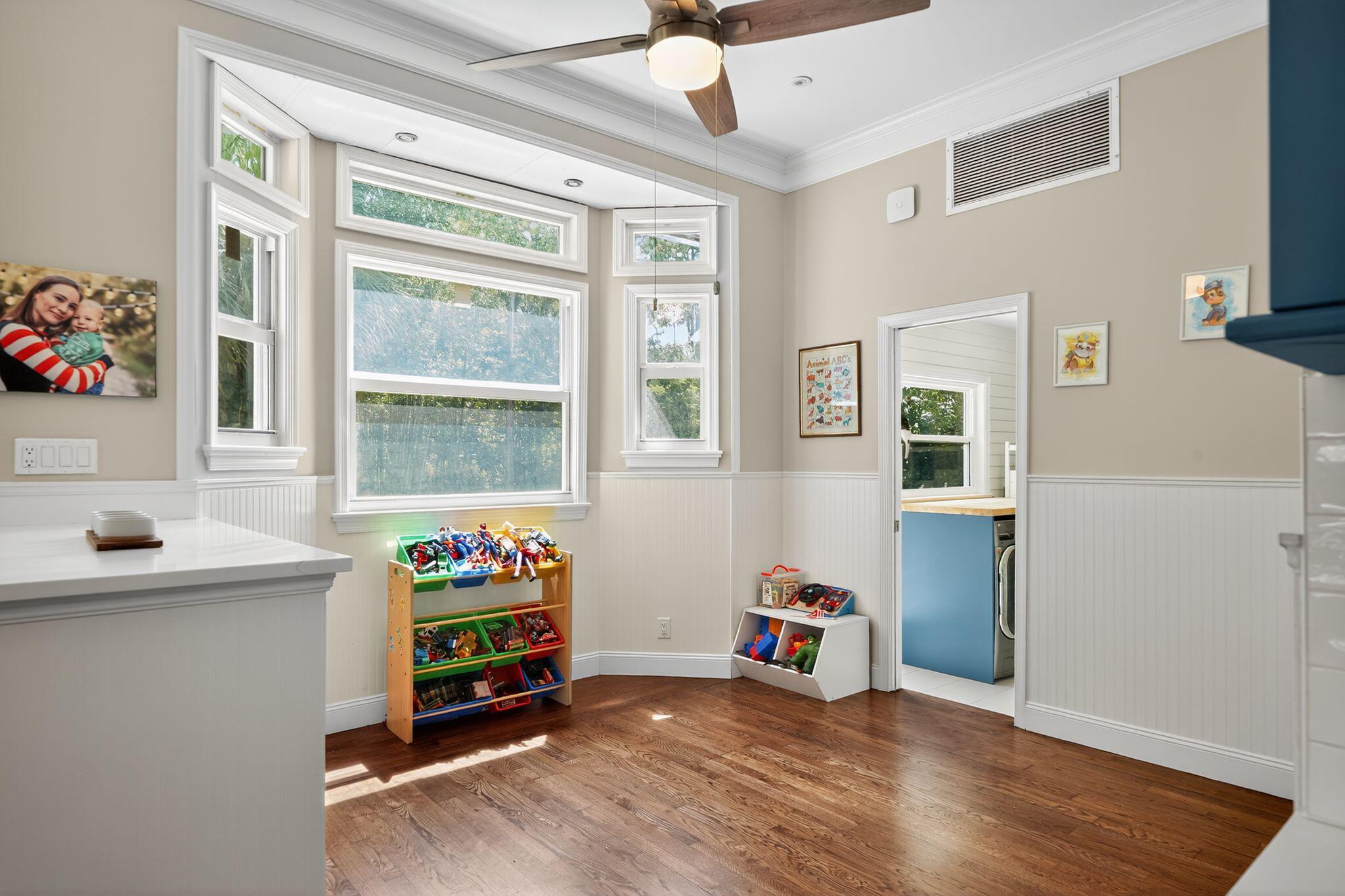 556 Meadow Wood Way Stuart, FL 34997 - Photo 28 of 57 a bedroom with a bed and a window