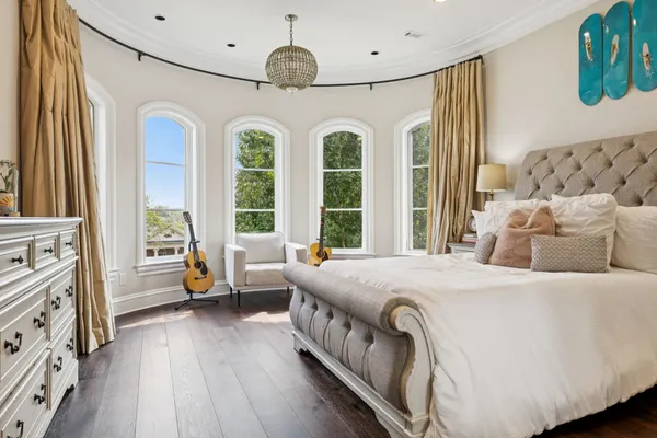 a kitchen with stainless steel appliances a sink stove and refrigerator