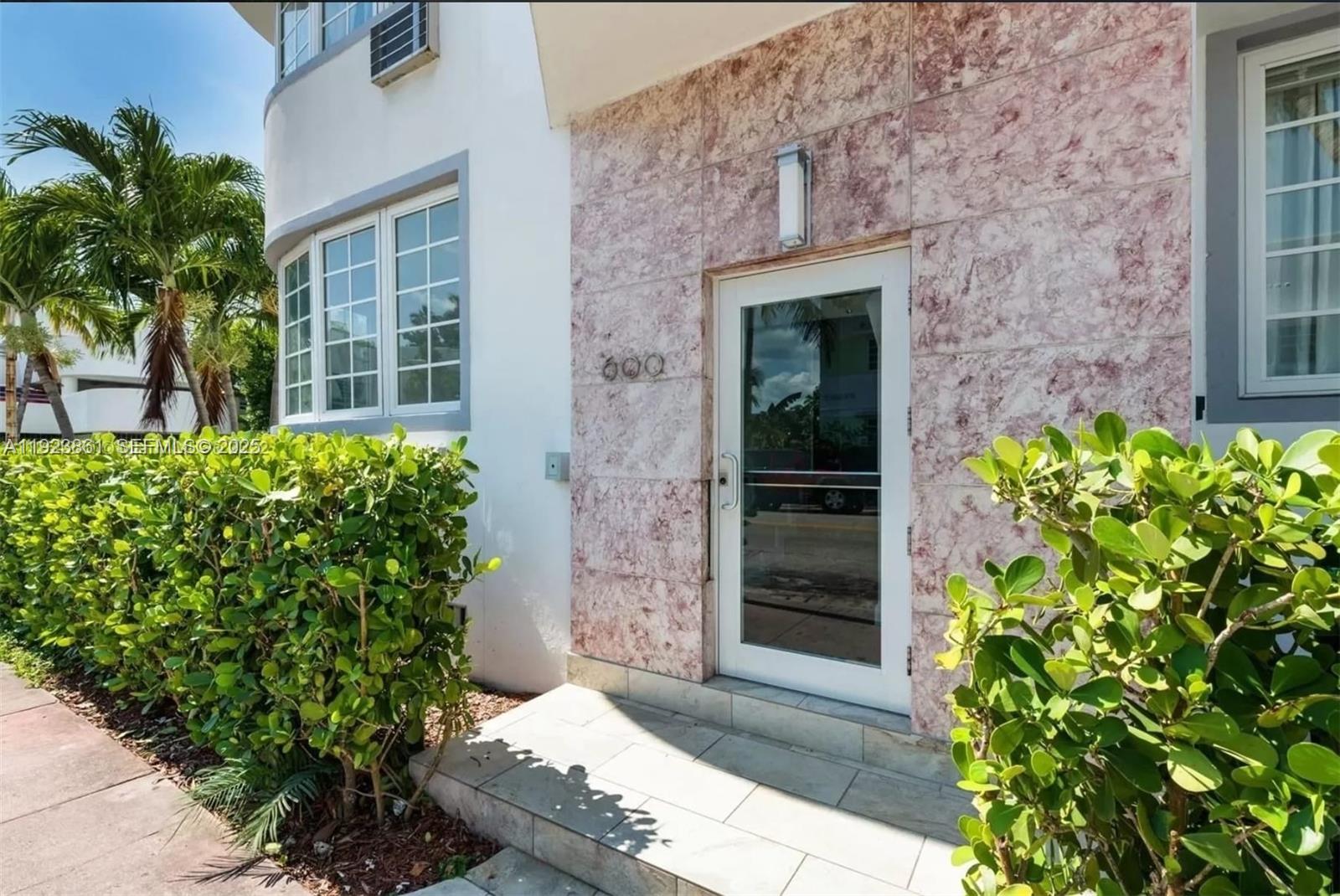 610 12th Street, Unit 5 Miami Beach, FL 33139 - Photo 2 of 8 front view of a house with a window